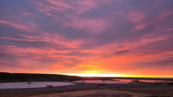 A colorful sunrise over the foothills