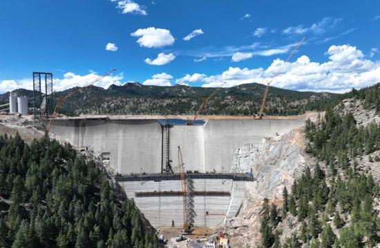 Gross Dam under construction. Scaffolding can be seen where steps are being put in place. 