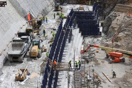 Heavy equipment works on the base of Gross Dam