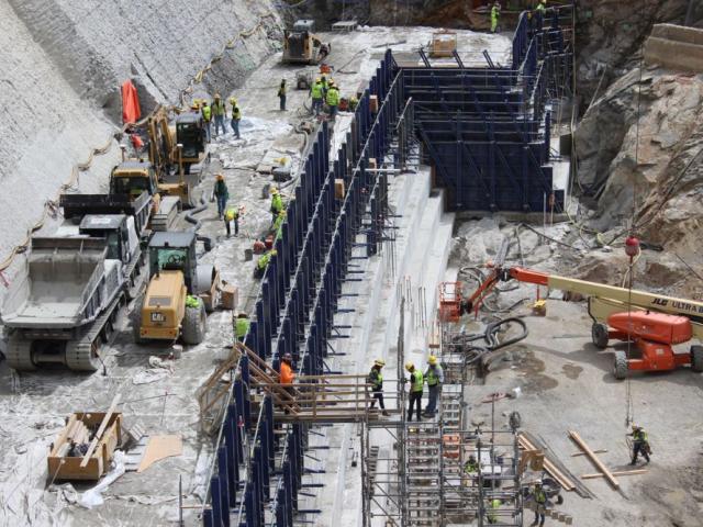 Heavy equipment works on the base of Gross Dam