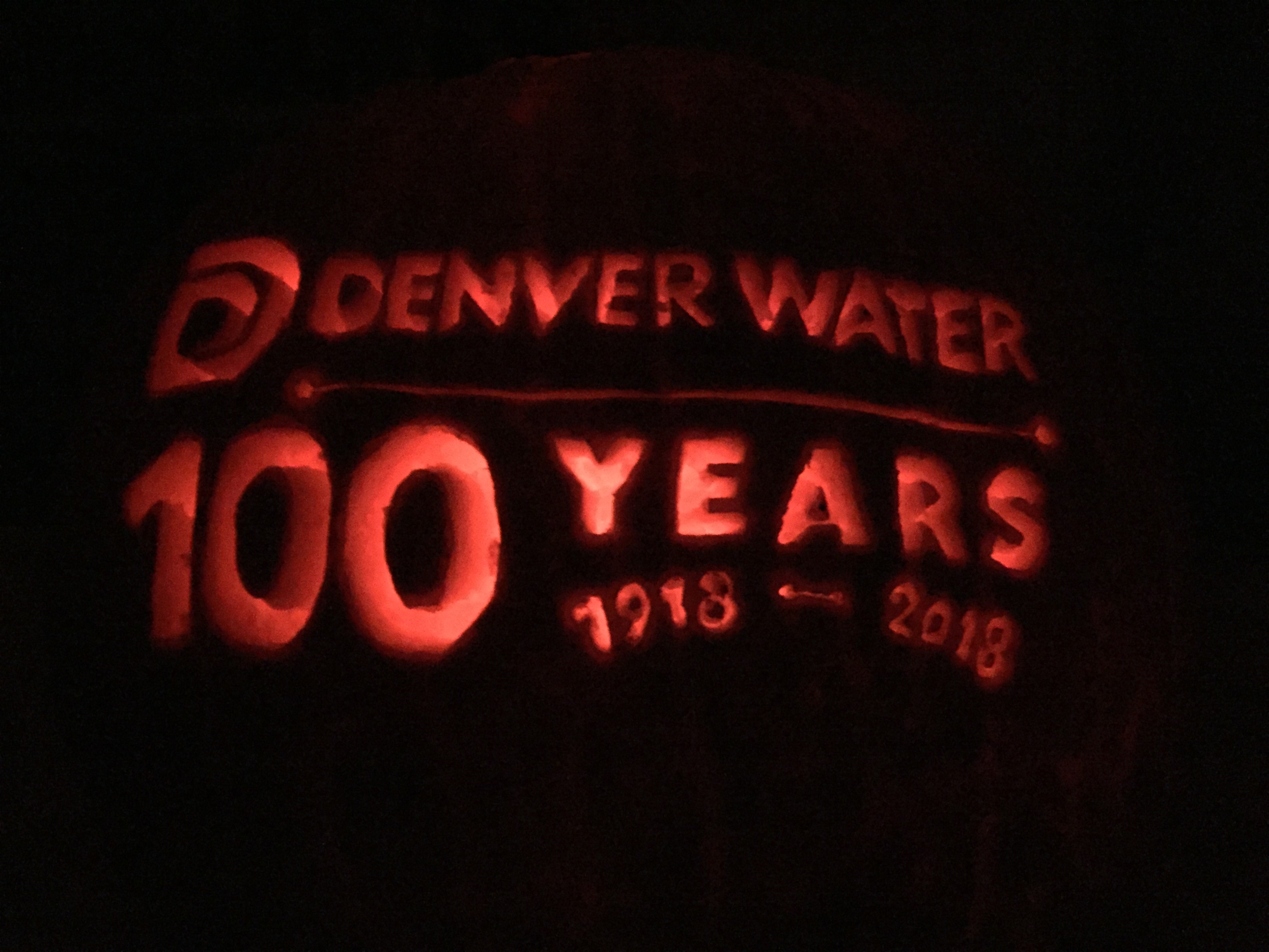 This is what Kim Unger's 2018 pumpkin, celebrating Denver Water's 100th anniversary, looks like when lit from within.